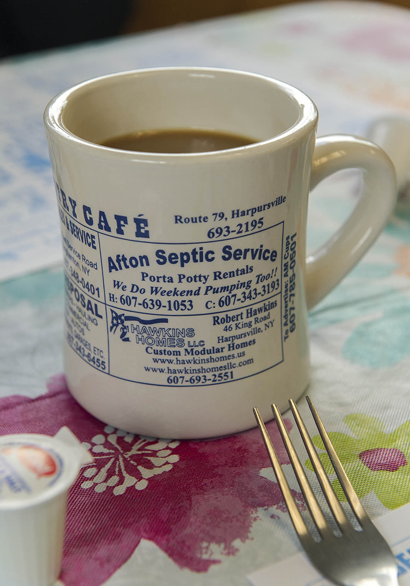 PAR_PhotoReporters_coffee-mug-ad-for-septic-service-at-Grammas-Country-Cafe_Harpursville_NY